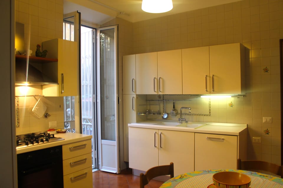 Kitchen - French windows onto private garden
