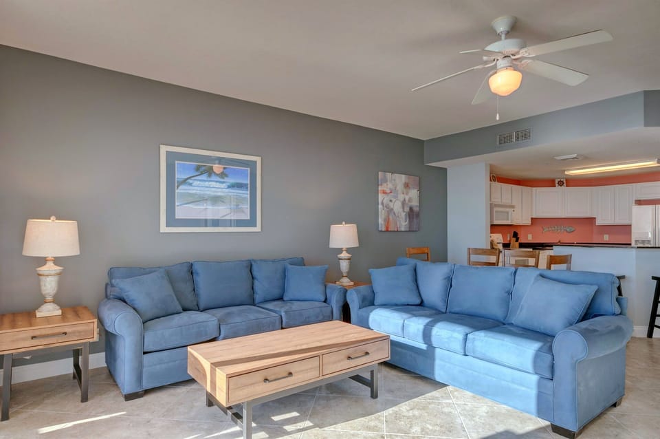 Living Room - Enjoy ultimate comfort in this spacious seating area with two plush sofas—one a sleeper for extra guests, the other perfect for lounging with the whole group. Plus a comfy chair!