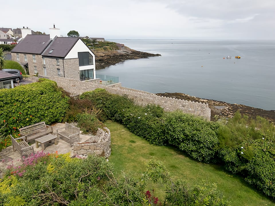 Patio, garden and sea view from 2nd bedroom 