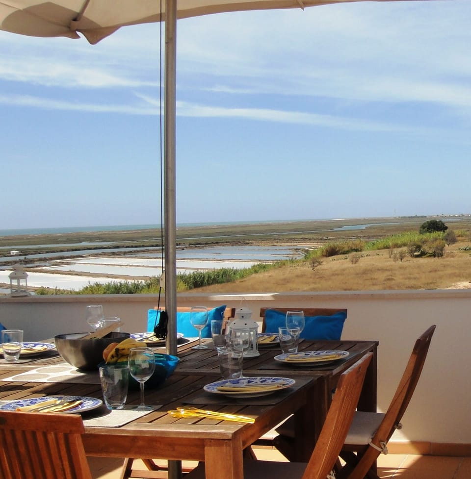 Enjoy lunch overlooking the salt pans, Ria Formosa and Atlantic Ocean