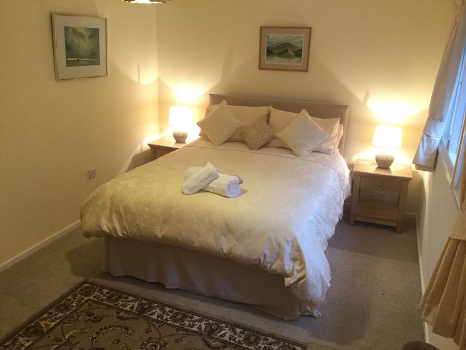 spacious master bedroom with King bed.
