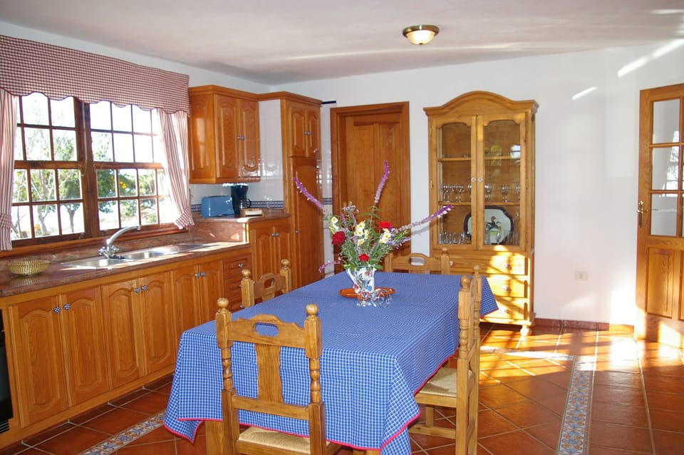 Light airy dining kitchen with sea views