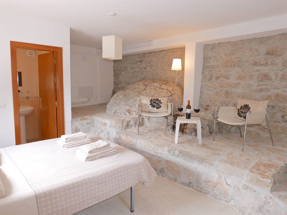 Glass of vino in the Bedrock bedroom - or maybe Scotch on the rocks...?