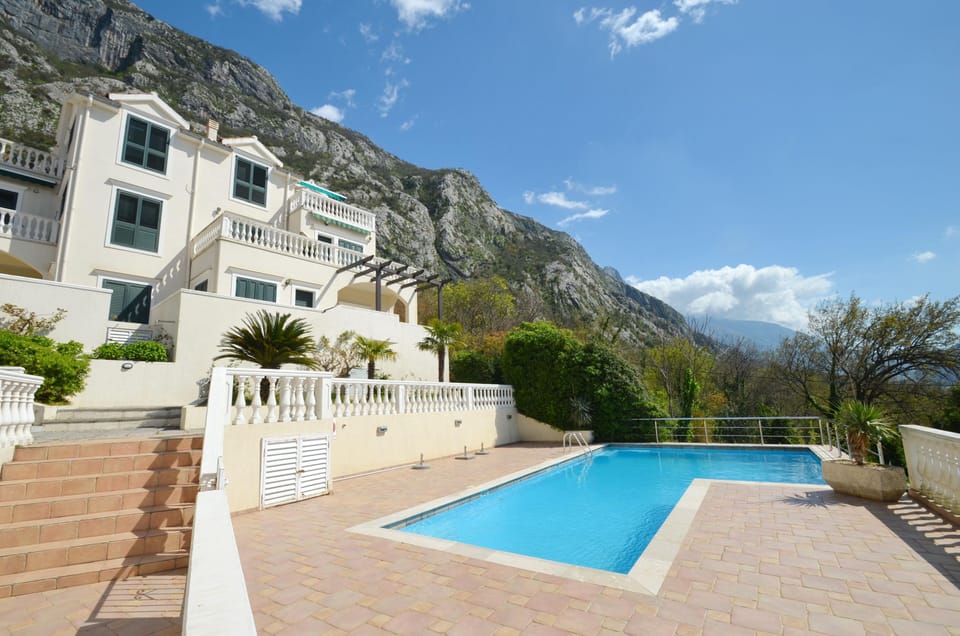 pool with sun loungers.