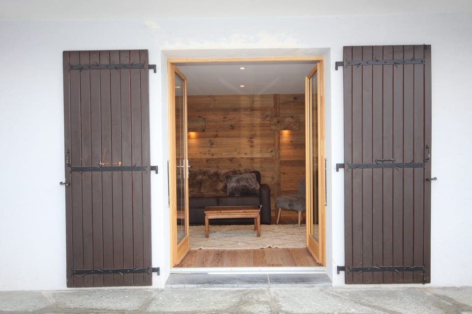 Patio doors from living area to front patio