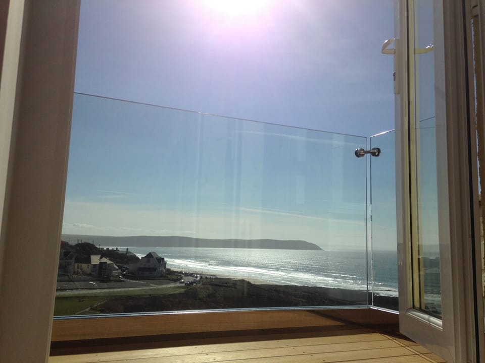 Decked glass balcony