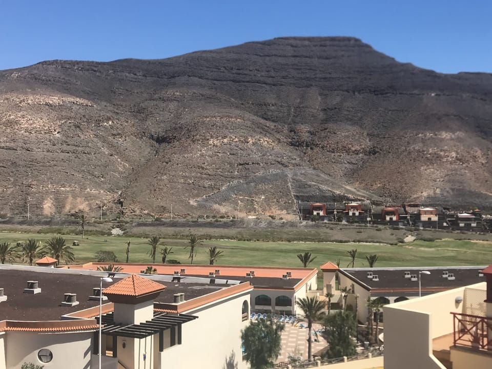 Golf course and mountain views from the roof terrace.