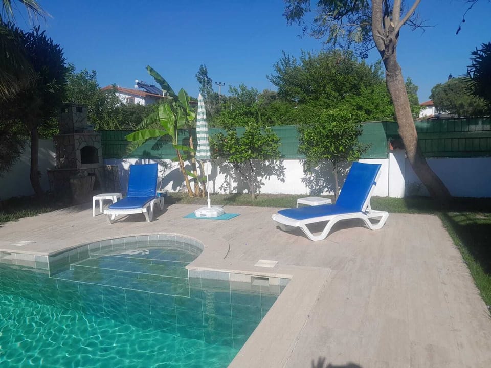 Chaise longue by the pool