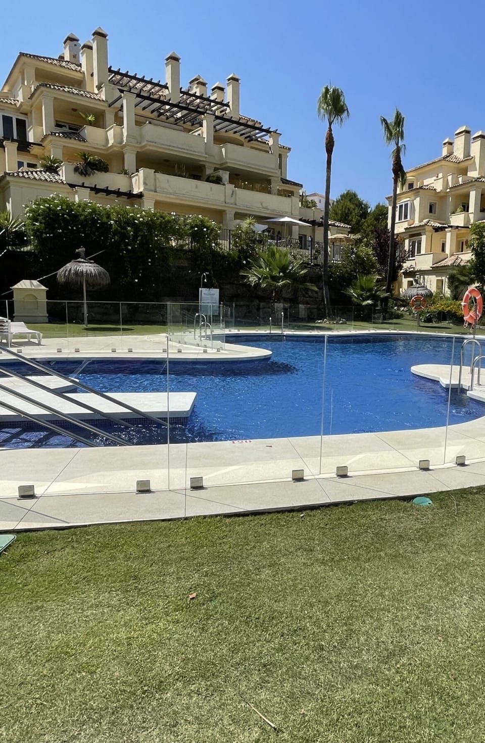 View of the property from the immaculate manicured poolside garden.