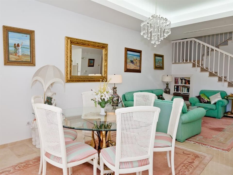 Modern dining area off the lounge for six guests