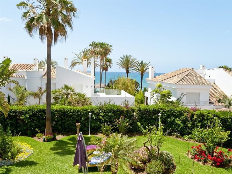 Stunning private swimming pool surrounded by gardens