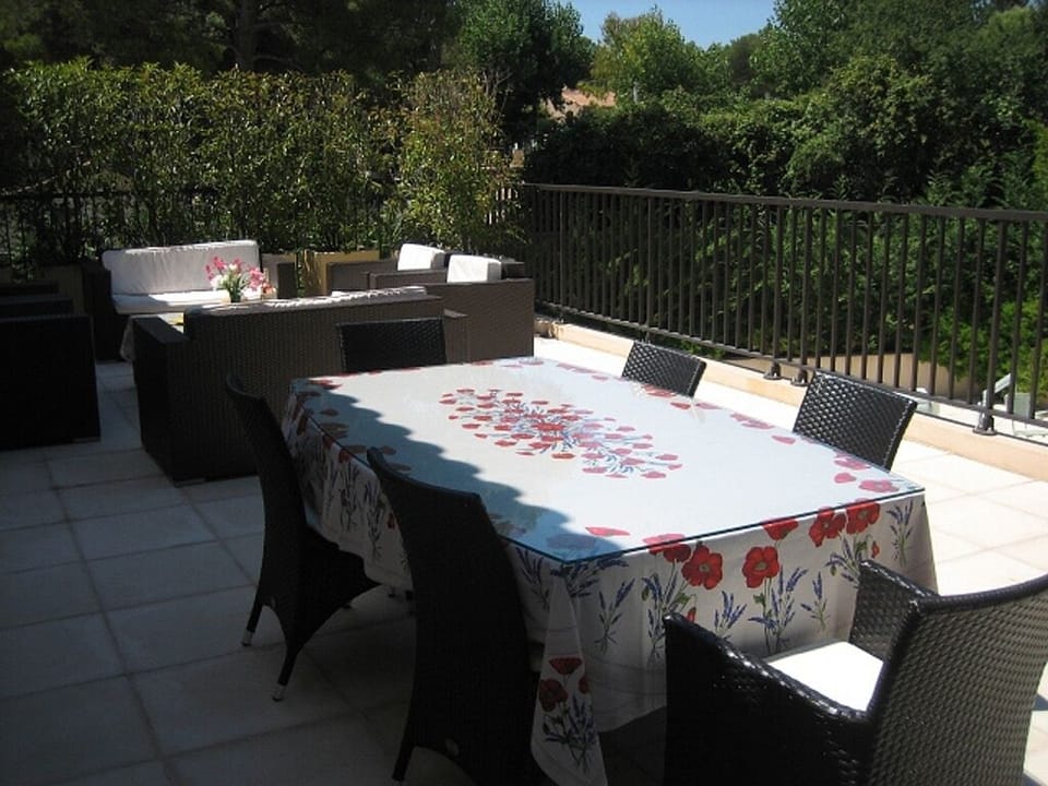 Private veranda showing dining and sitting areas