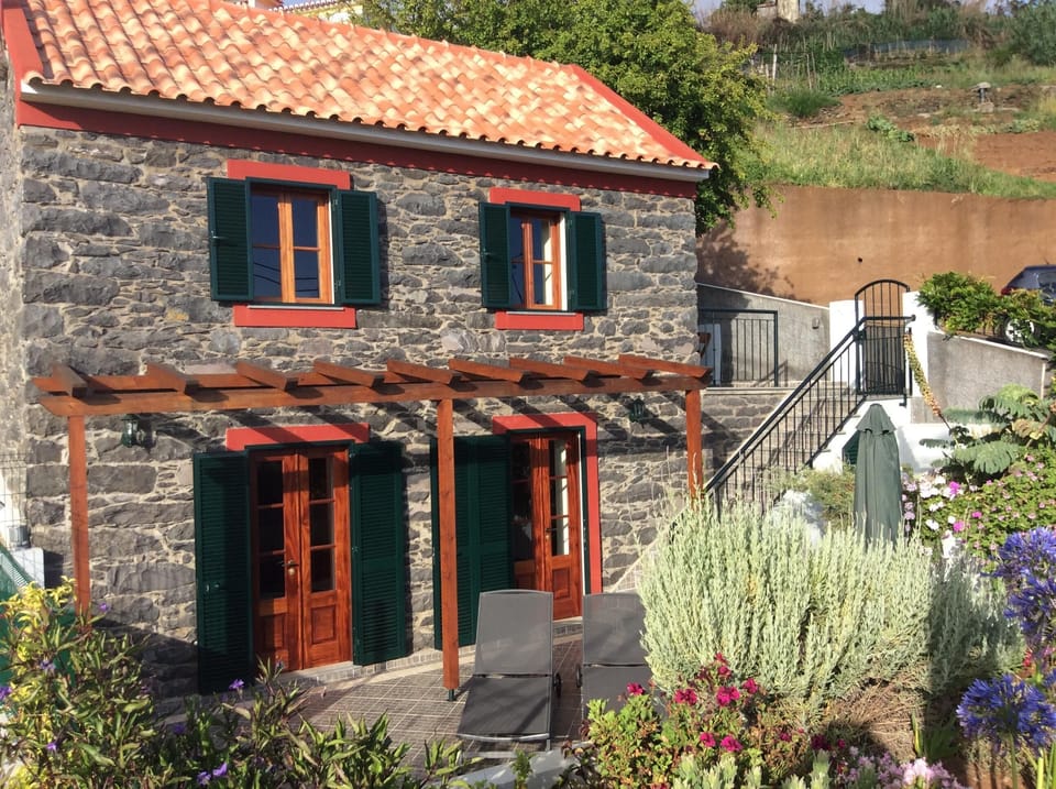 House and flower filled garden