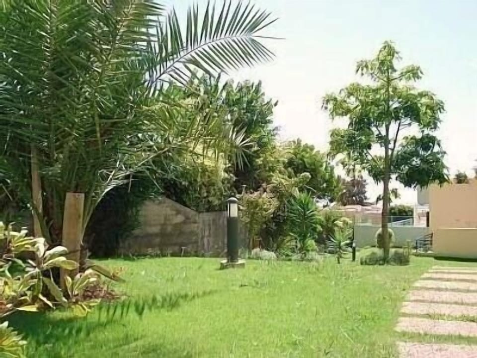 Lush, tropical gardens of the apartments