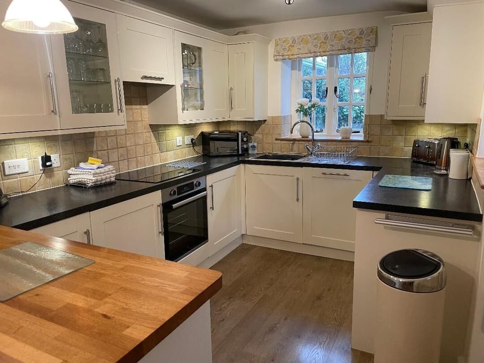 Well equipped spotlessly clean kitchen
