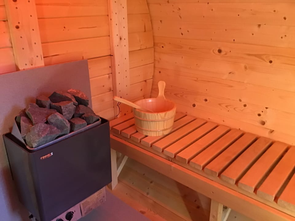 Your sauna has mood lighting and can be set to different colours internally.