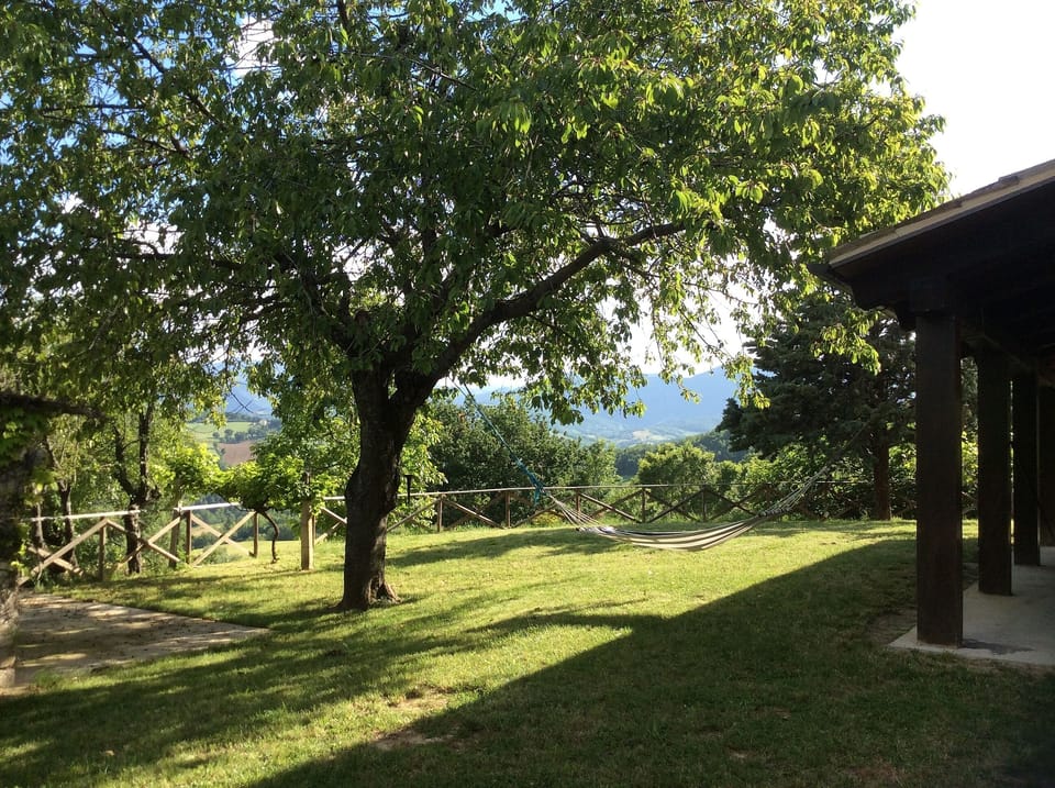 Shady capana with a view towards the mountains