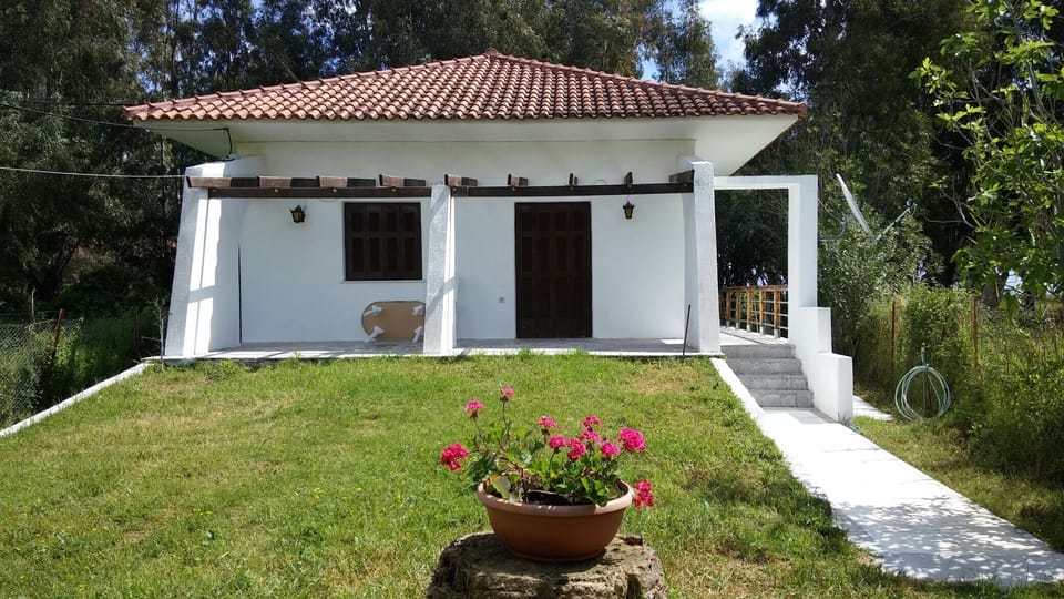 The villa from the gate entry. Back door leads to the beach, 30 meters away.