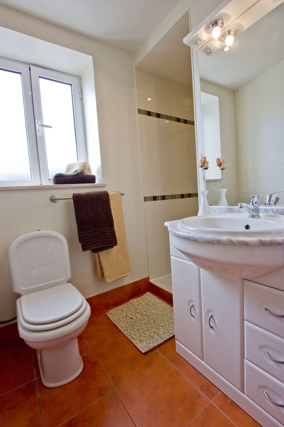 Full size fridge/freezer, washing machine, dishwasher and hob oven combination.