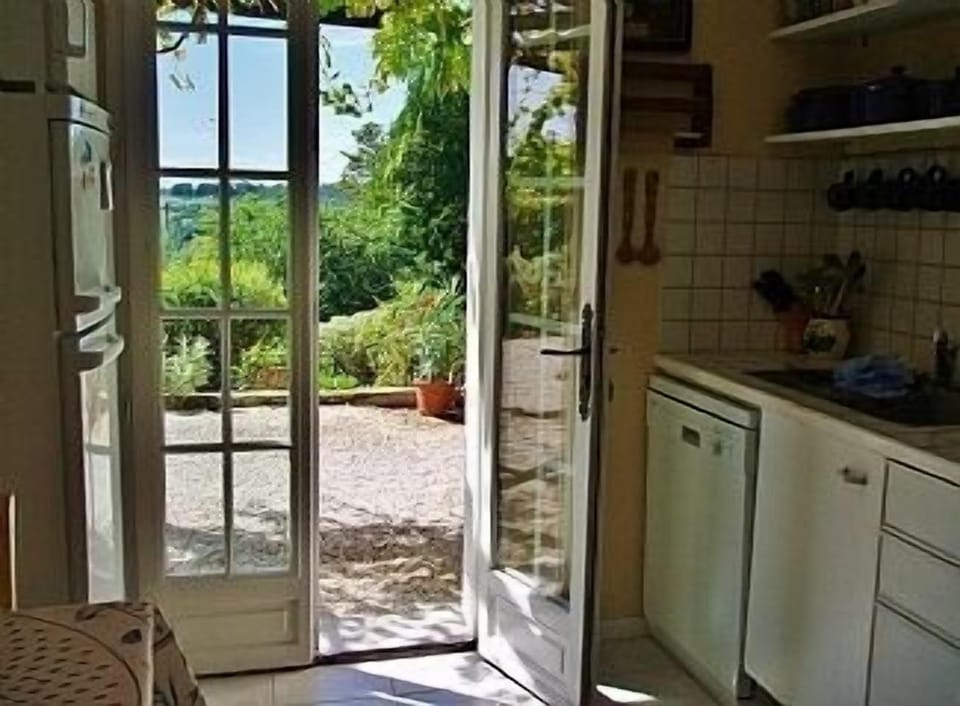 French windows from the kitchen to the terrace