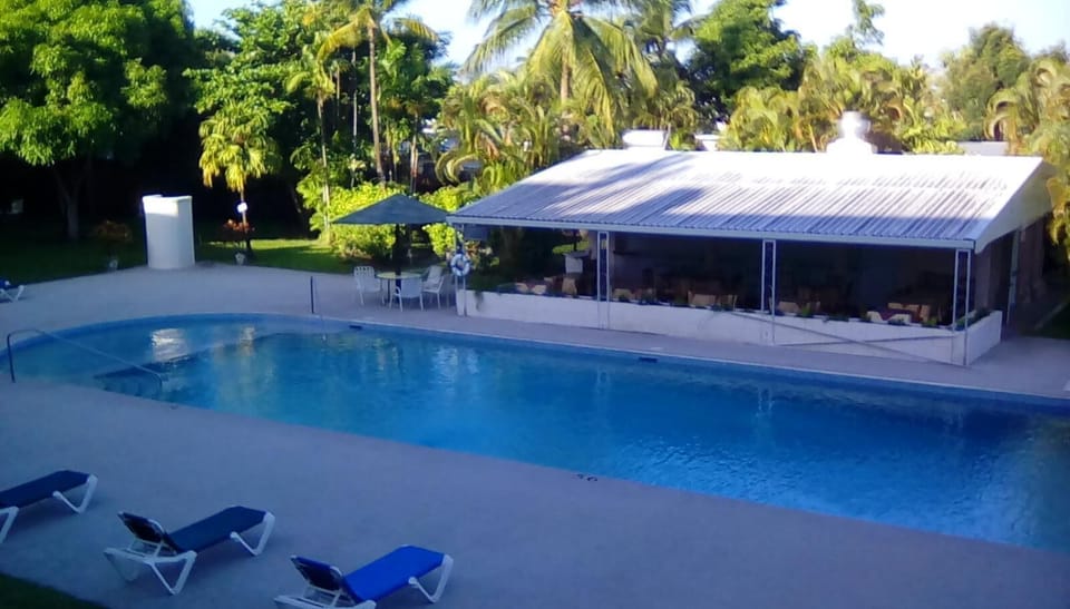 View from our balcony to the pool and Chinese Restaurant.