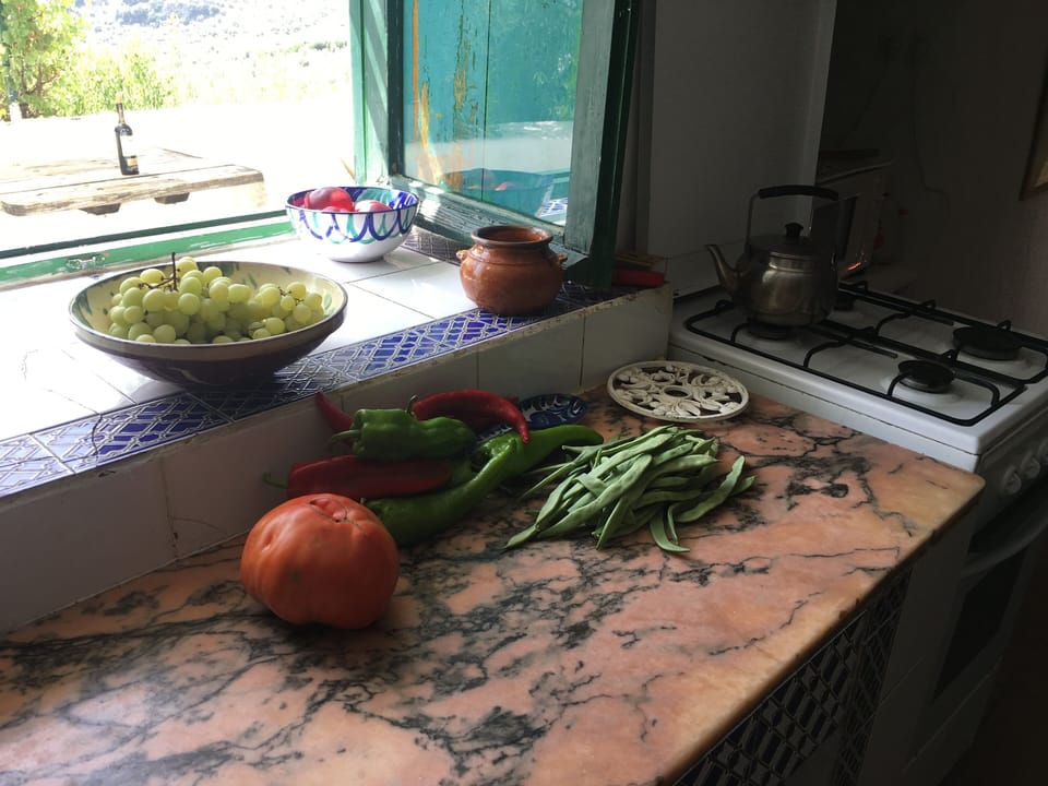 Kitchen bench with open window to terrace