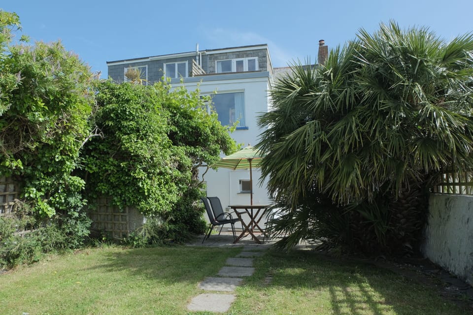 Back encosed private sunny garden