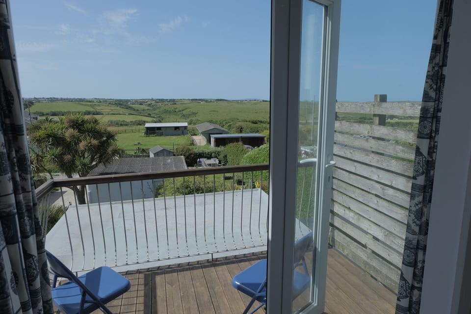 Balcony view from top bedroom of fields