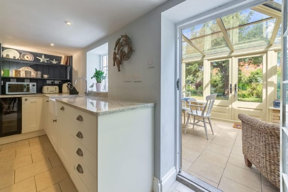 Ground floor: The kitchen leads through into the conservatory