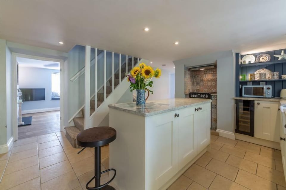 Ground floor: The staircase leads to the first floor from the kitchen