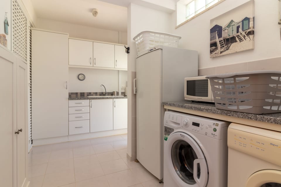 Downstairs Laundry Room / Kitchen Area with access to back yard 