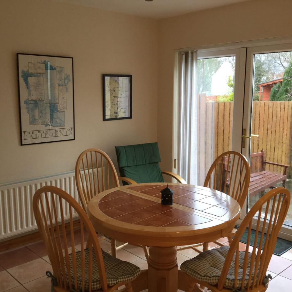 Dining area with patio doors to garden