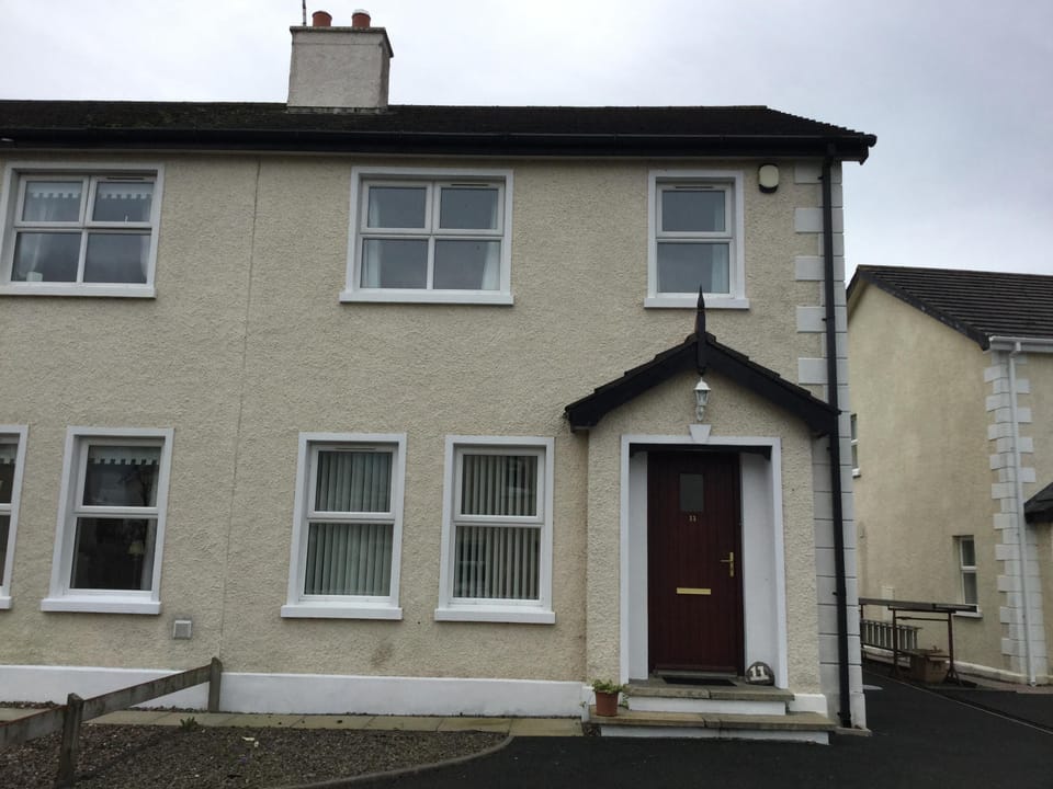 Front of house, parking for 3 cars
