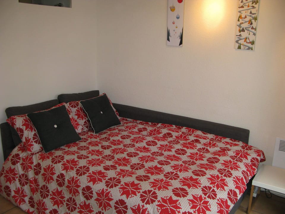 Double sofa bed in lounge with storage under for bedding