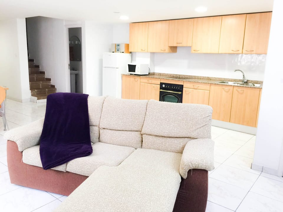 Basement living area and kitchen
