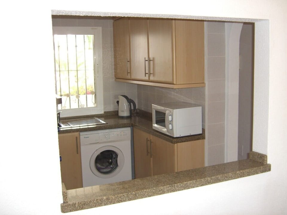 Kitchen with Washing Machine & Microwave