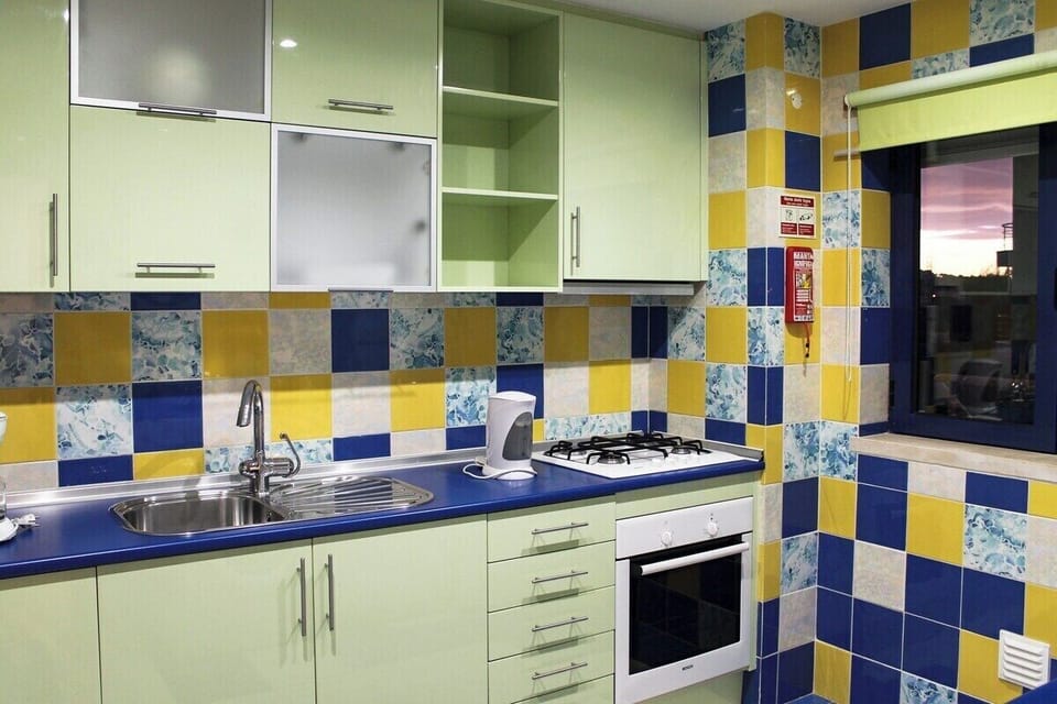 Equipped with cooker and oven, kettle, toaster, microwave and coffee machine and fridge with freezer