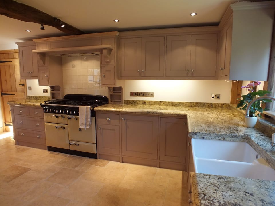 Bespoke Kitchen with Range Cooker and seating area