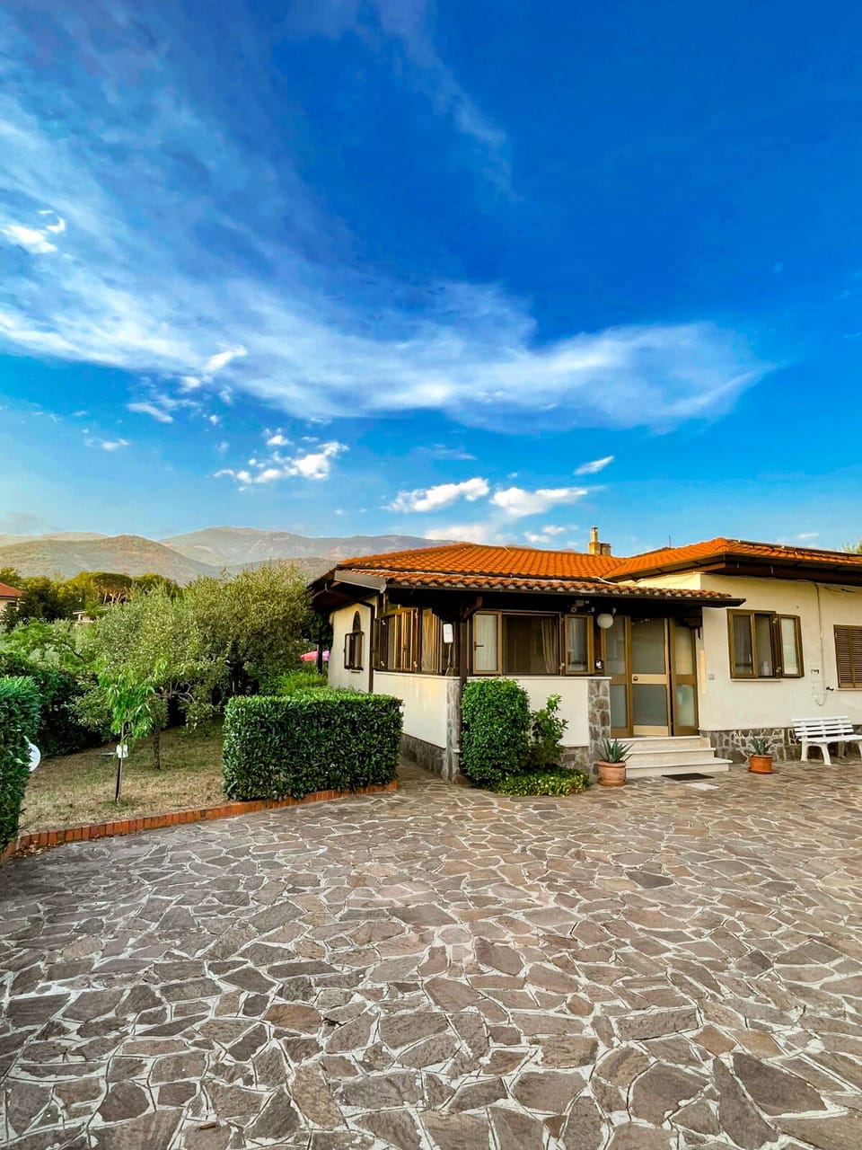 The front of the villa with views to the mountains