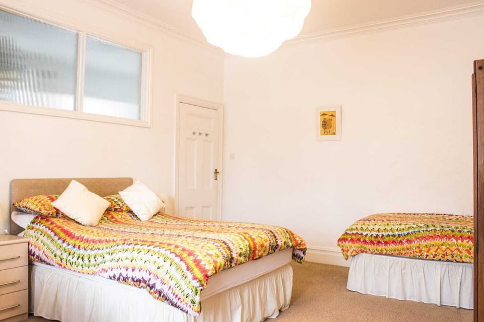 Another view of the larger bedroom 