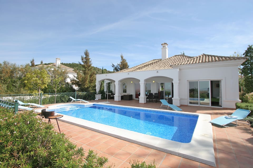 view over pool to villa