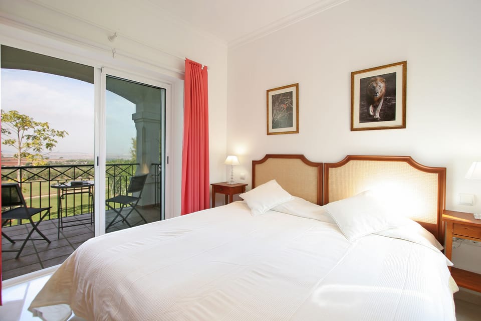 bedroom 2 with balcony