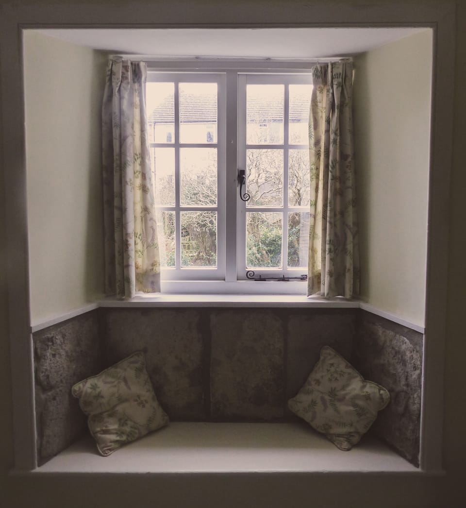 Second bedroom  window seat looking out onto garden