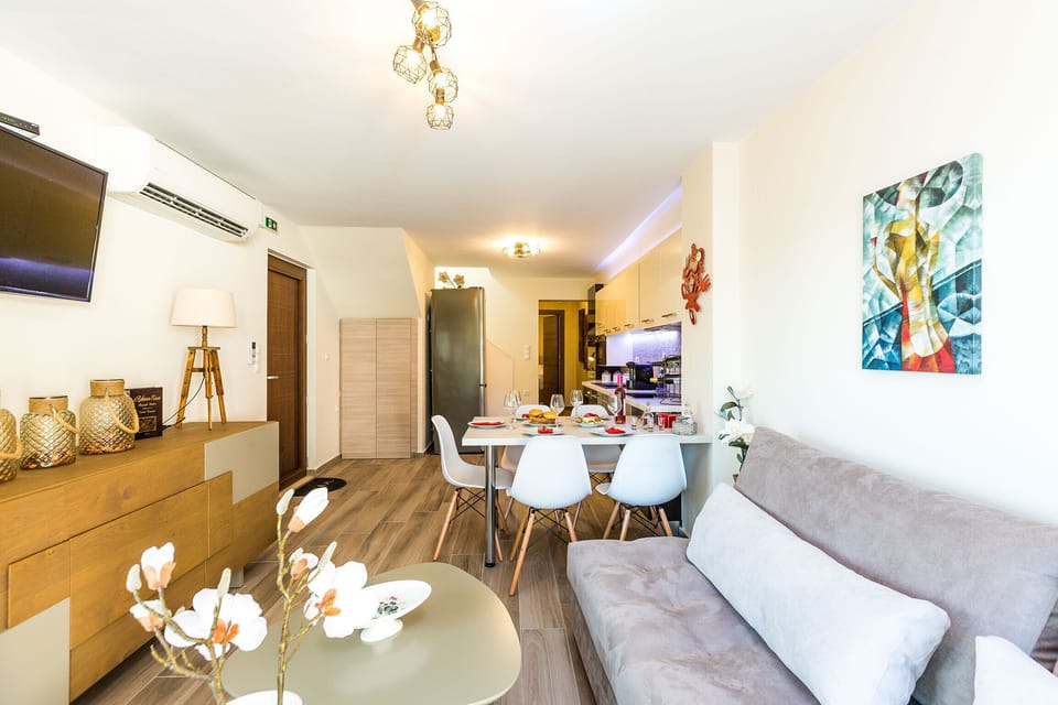 Open plan area with living , dining & kitchen area