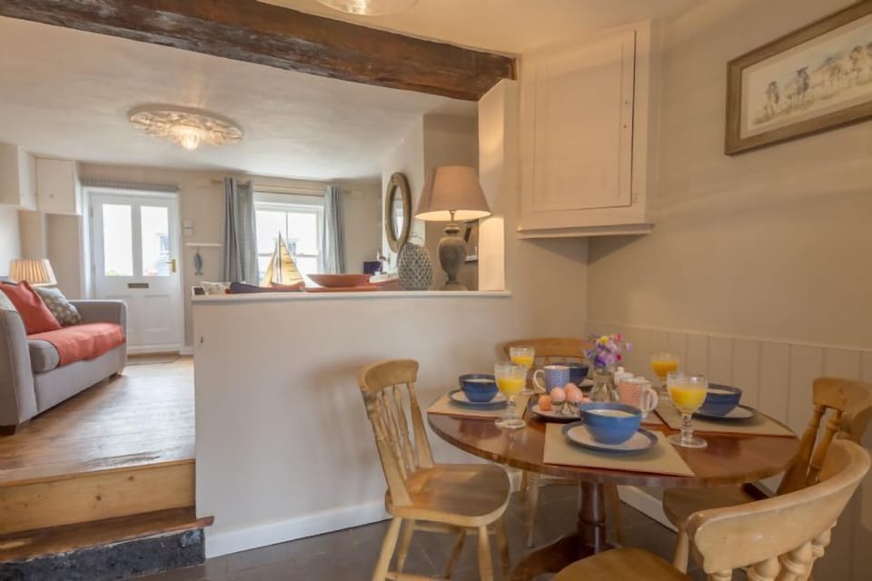 Ground floor: Dining area with step up to sitting room