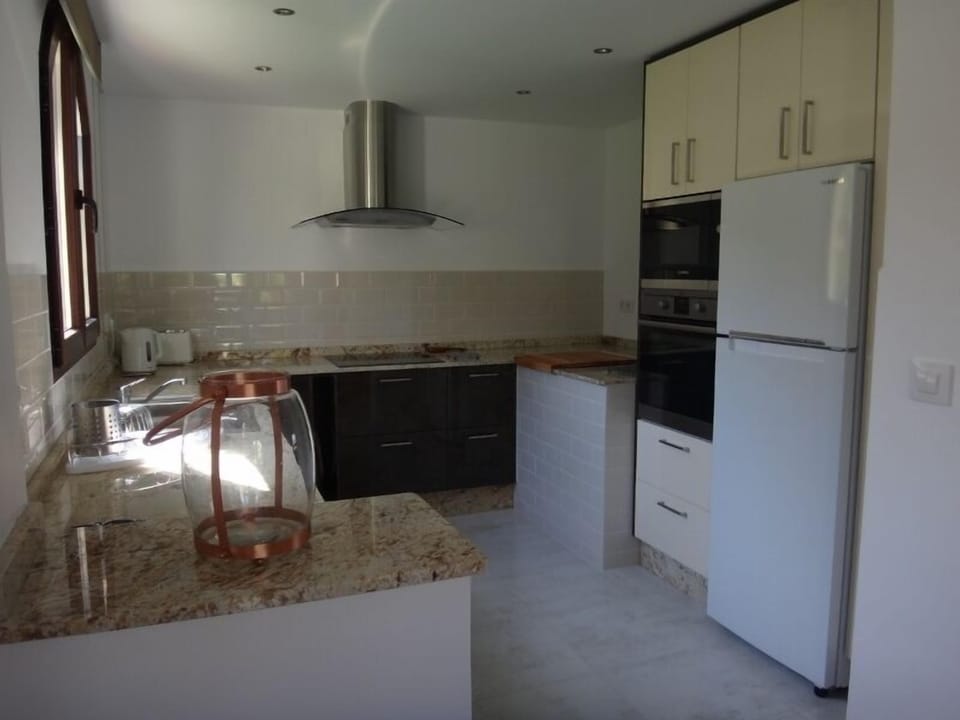 The kitchen viewed from the dining area.