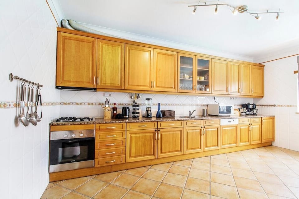 Fully equipped kitchen with all amenities.