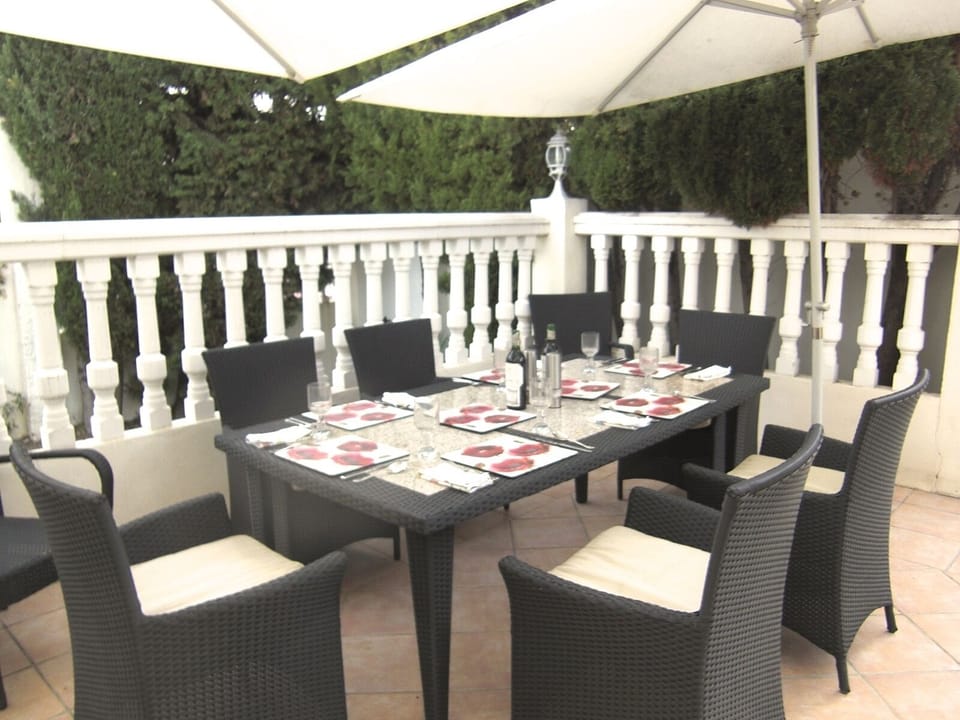Dining by poo now with pergola above