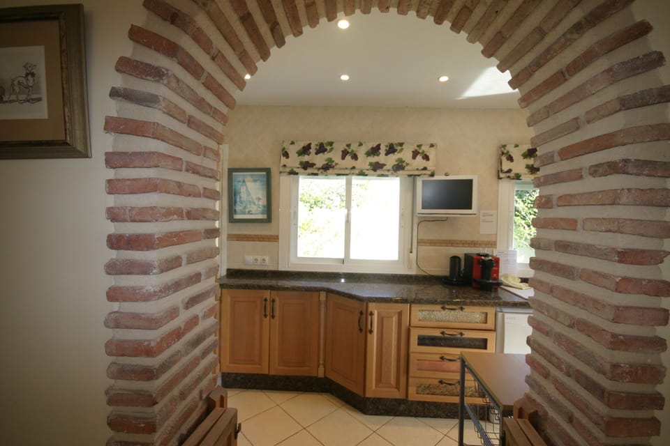 from dining room into kitchen