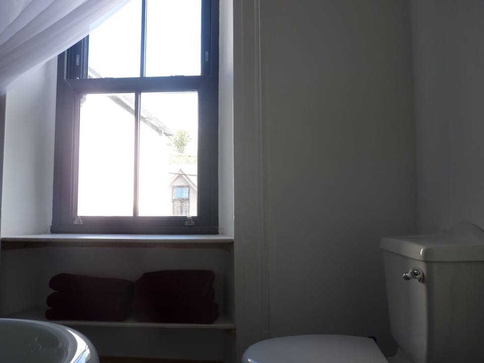 Lots of natural light and yet privacy for the bathroom